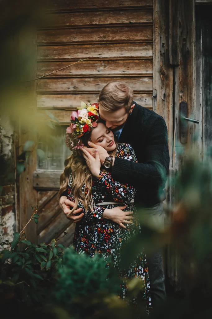family-portrait-expacting-couple-man-hugs-tender-pregnant-woma
