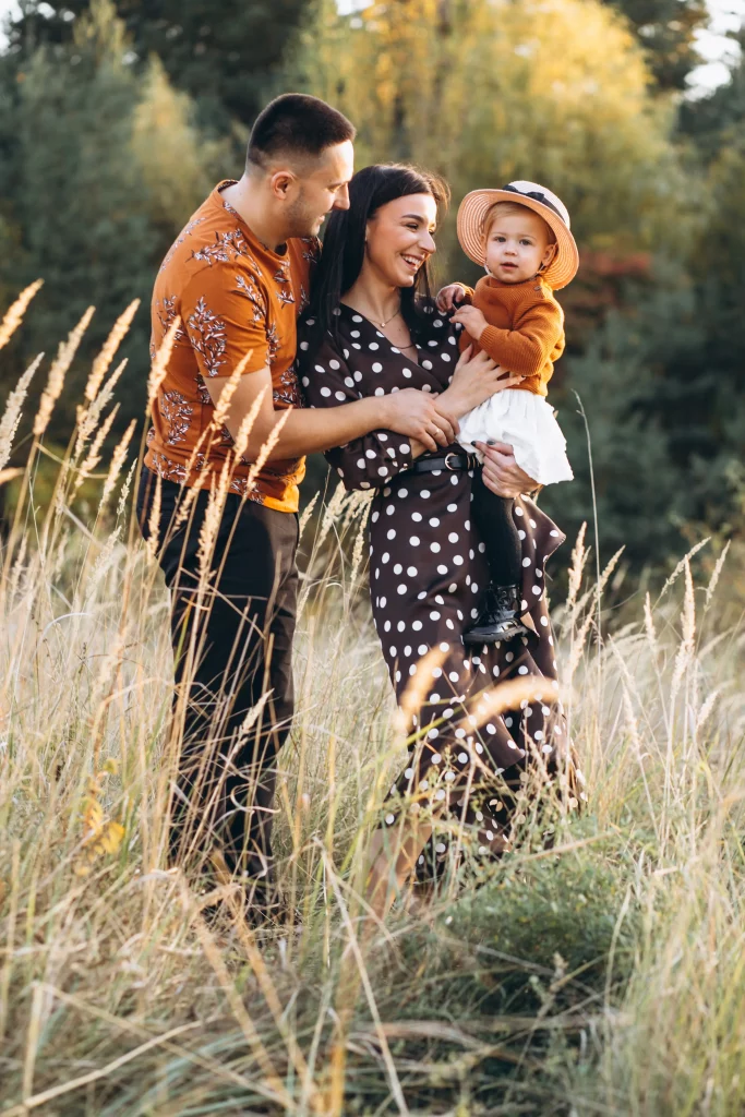family-with-their-little-daughter-autumn-field