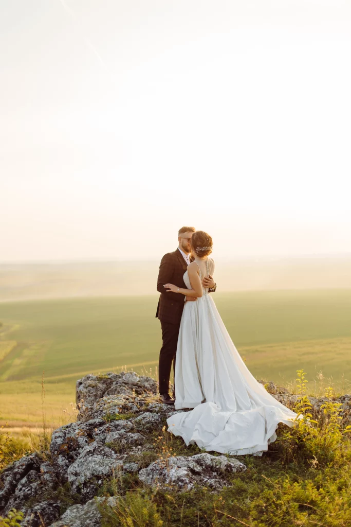 loving-couple-wedding-newlyweds-outside-sunset-beautiful-summer-day
