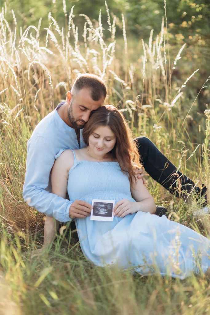 portrait-lovely-couple-standing-together-greenfield-happy-couple-expecting-baby-young-family-concept