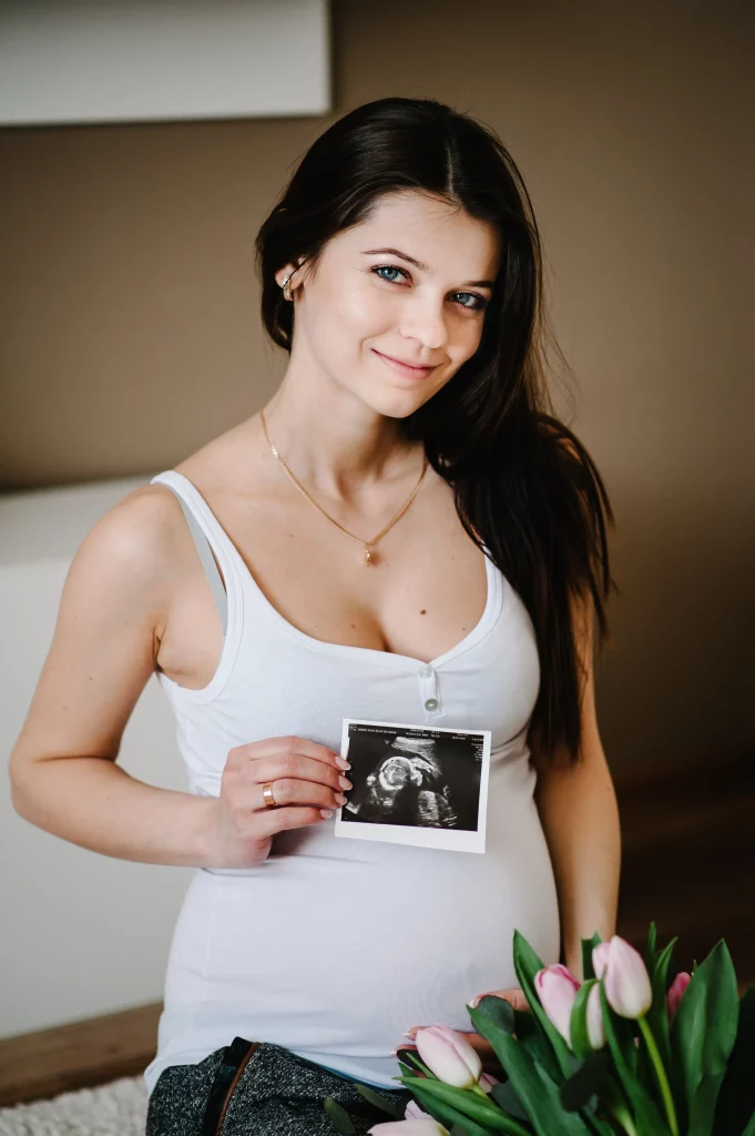 pregnant-woman-holding-ultrasound-scan-photo-picture-belly-her-future-daughter-son-arms-girl-expecting-newborn-motherhood-concept-baby-shower
