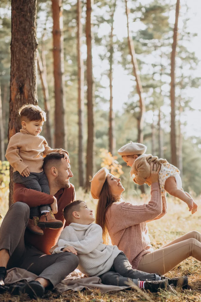 young-family-with-children-having-picnic-park