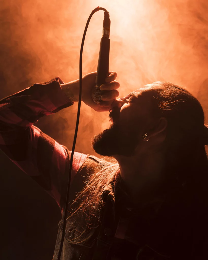 side-view-person-holding-microphone-sings
